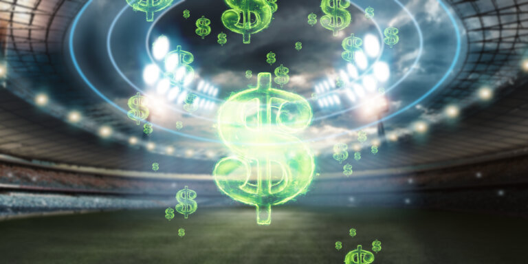 Close-up image of the American dollar sign against the background of the stadium. The concept of sports betting, making a profit from betting, gambling. American football